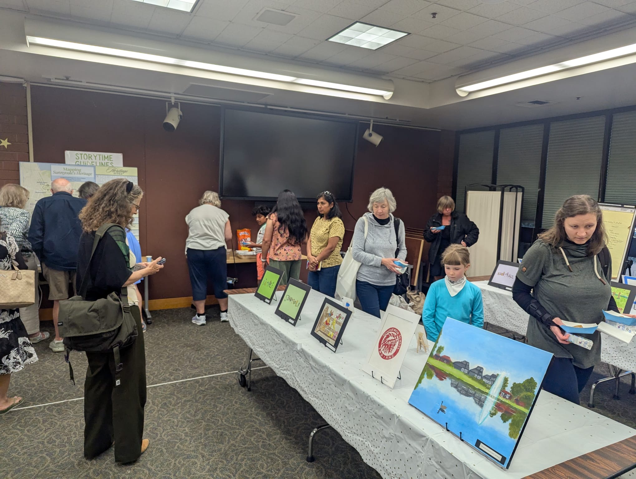 Community members exploring heritage exhibits